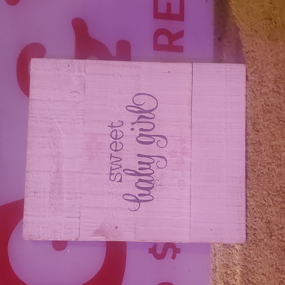 Wooden sign for baby's girl's room